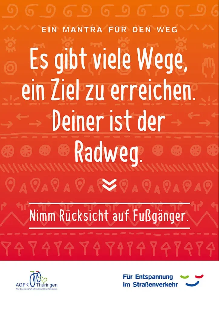 AGFK Thüringen Mantra für den Weg "Es gibt viele Wege, ein Ziel zu erreichen. Deiner ist der Radweg." rotes Plakat